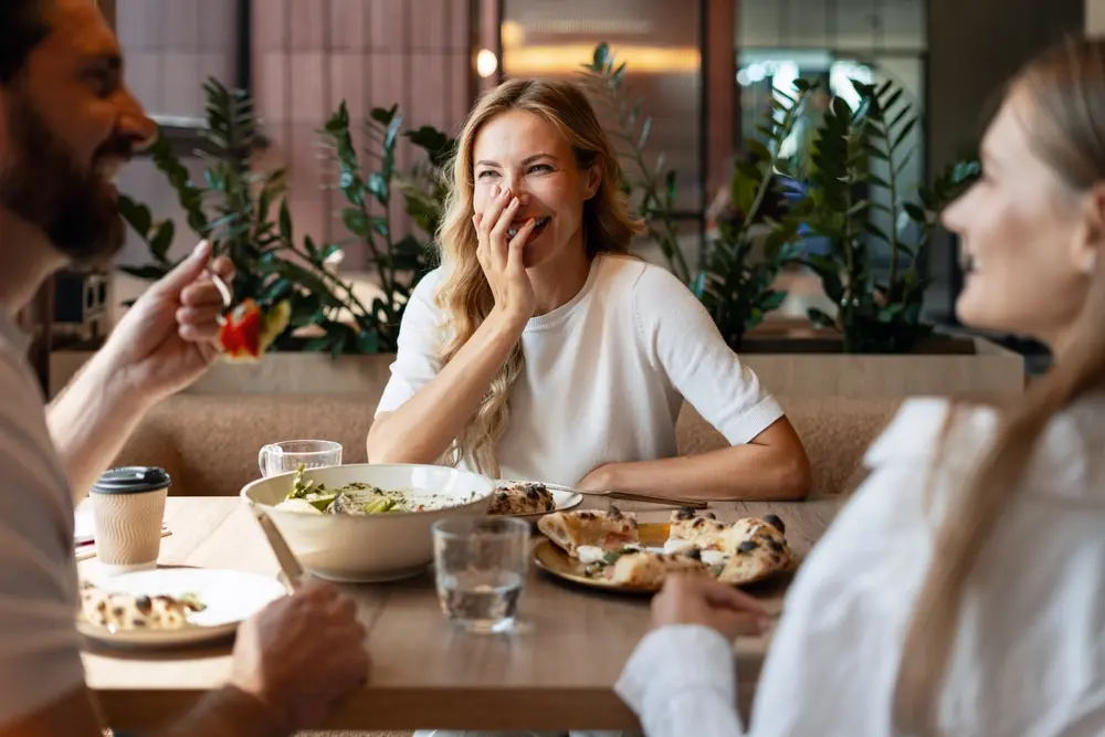 Woman enjoying lunch with friends