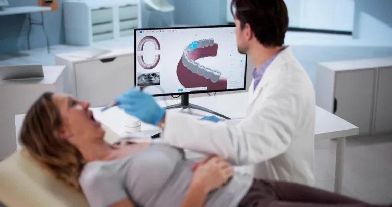 Doctor using a 3D oral scanner for imaging